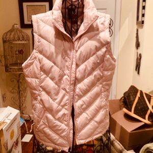 Northface pink puffer vest.  Great condition.  MOVING SALE!!